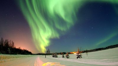 Aurora borealis. Northern lights over Bear Lake, Eielson Air Force Base, Alaska.