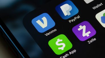 Venmo, PayPal, Cash App, and Zelle app icons are seen on an iPhone.