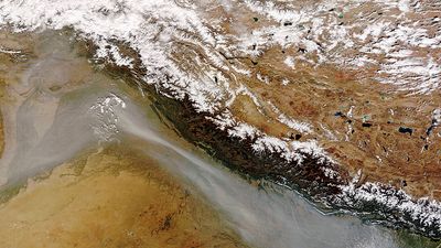Himalayas. Earth Day. Global warming. A satellites view of thick band of haze from agricultural fires and urban pollution near the India Pakistan border along the southwestern face of the Himalaya Mountain range, Oct. 30, 2008. (see notes)